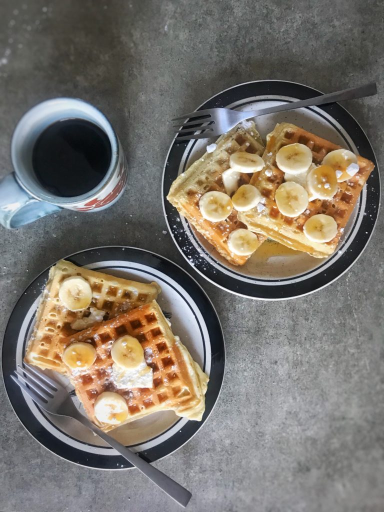 Two plates of waffles and a cup of coffee | RealLifeWithDad.com