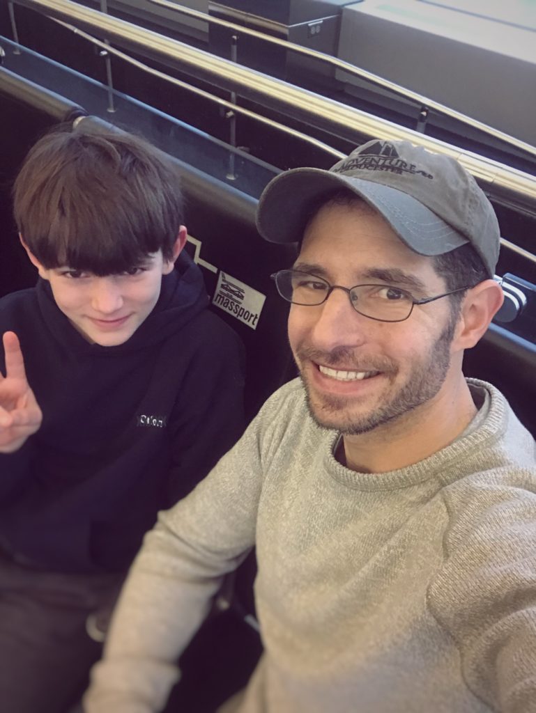 waiting for our plane while flying with kids | RealLifeWithDad.com