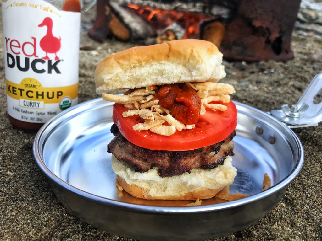 Stuffed campfire burger with red duck curry ketchup | reallifewithdad.com