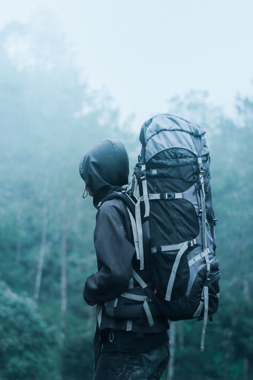 Backpacker in the woods with fog - Hiking the Presidential Range | Reallifewithdad.com