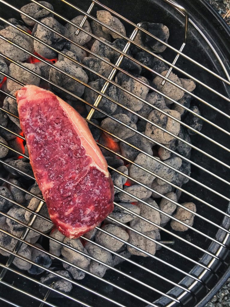 NY Strip over charcoal