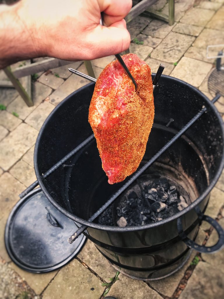 corn beef going in the smoker