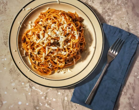 Short rib pasta sprinkled with shredded fontina.