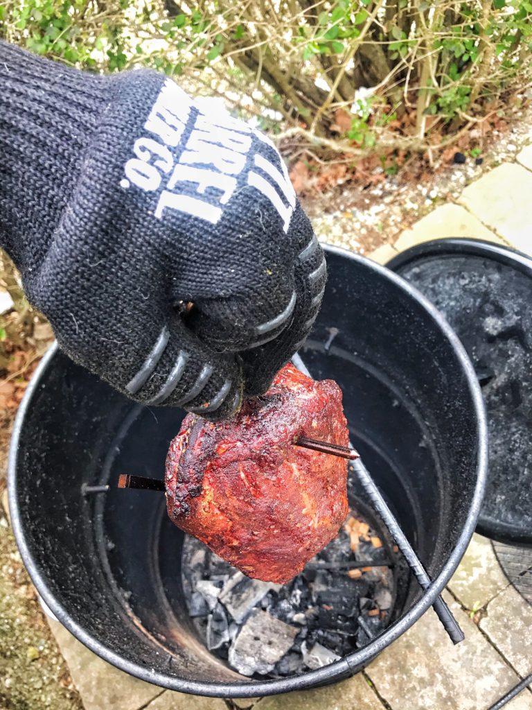 Pulling the brisket out of the smoker