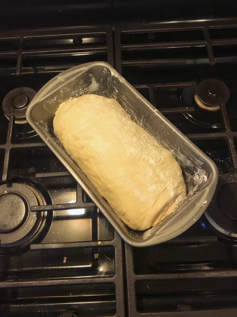 Dough rising in a bread pan