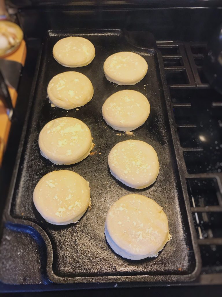 english muffins on the griddle