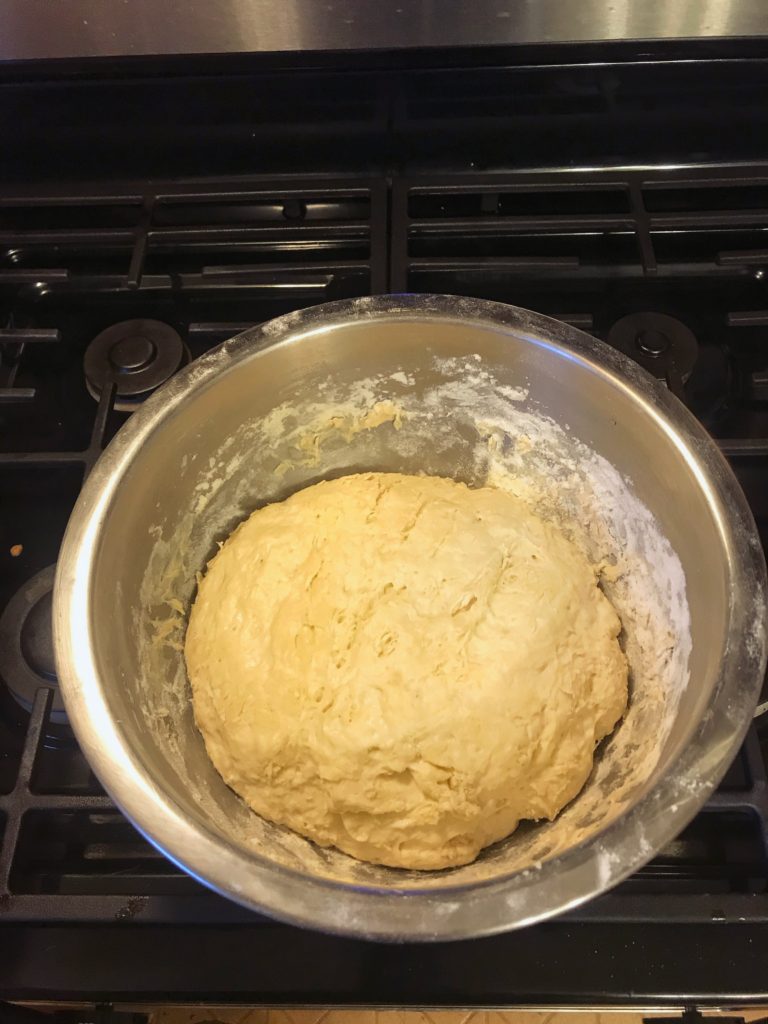 white bread dough in a bowl