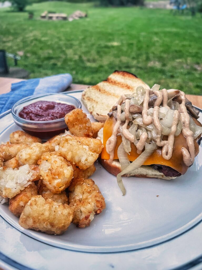 whiskey mushroom burger on a plate in the yard